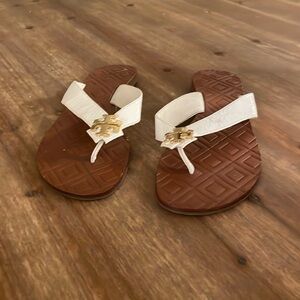 Tory Burch white leather capri flip flops, gold emblem, 6 1/2, minor wear.